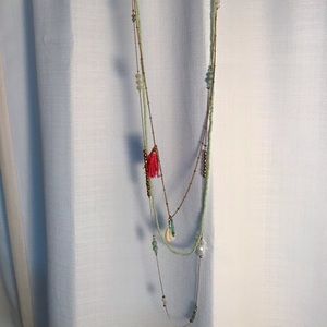 Long multi strand necklace